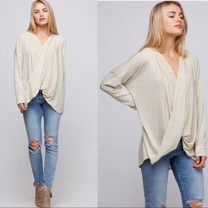 Wrap front dolman sleeve top
